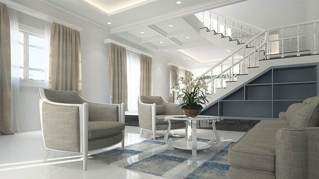 A living room with a stairs