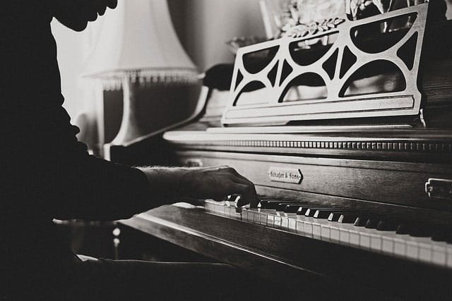 a man plays the piano