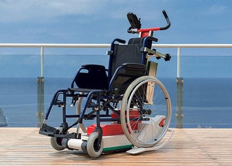 A wheelchair on a tracked stair climber Domino People